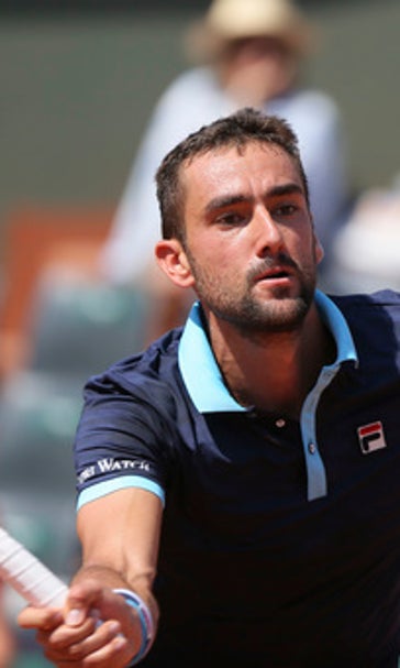 The Latest: No. 12 Keys loses to 290th-ranked qualifier